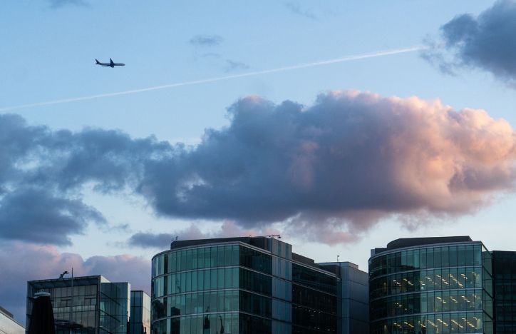 Plane flying over London.jpg