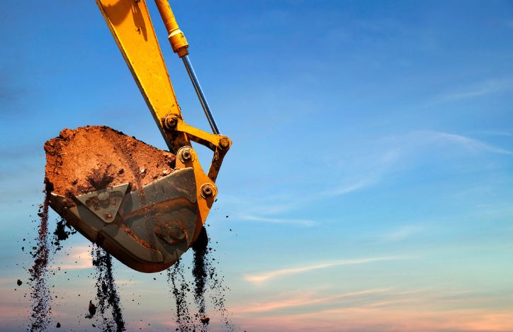 Excavator Lifting Dirt