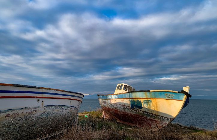Old boats by the water.jpg