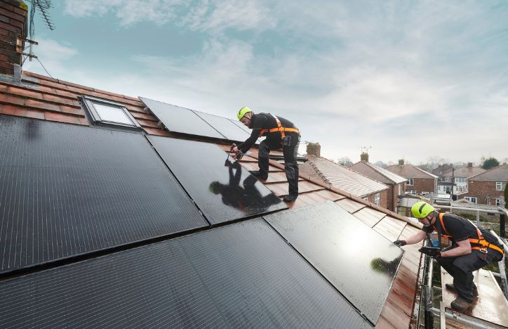 Solar Panels Being Installed On A House